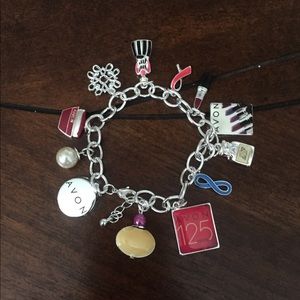 Avon 125th silver charm bracelet makeup perfume